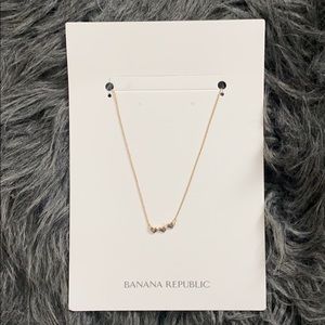 Triple gold heart Banana Republic necklace